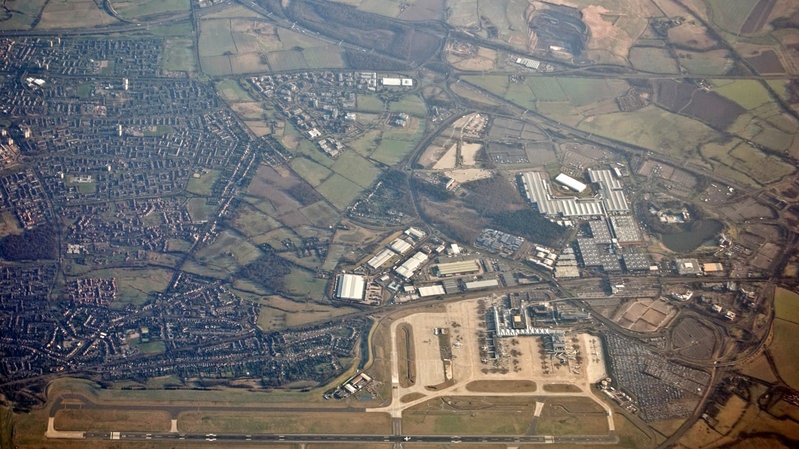 Aerial view of Birmingham Airport, representing other UK airport destinations